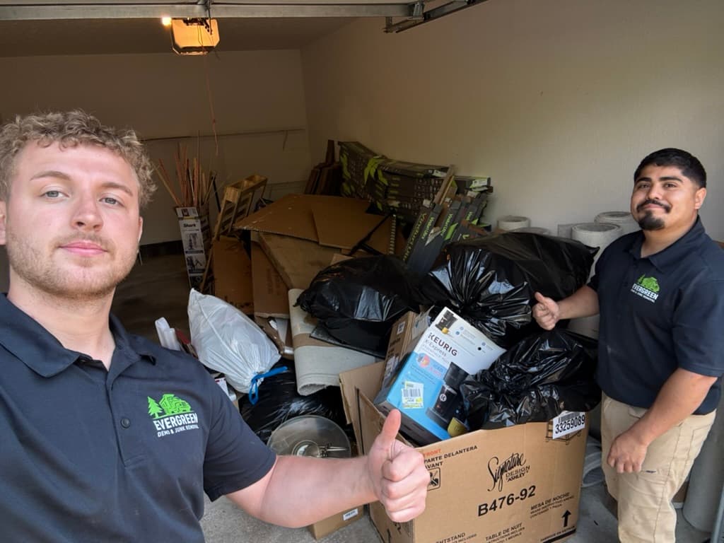 Evergreen team completing a garage cleanout