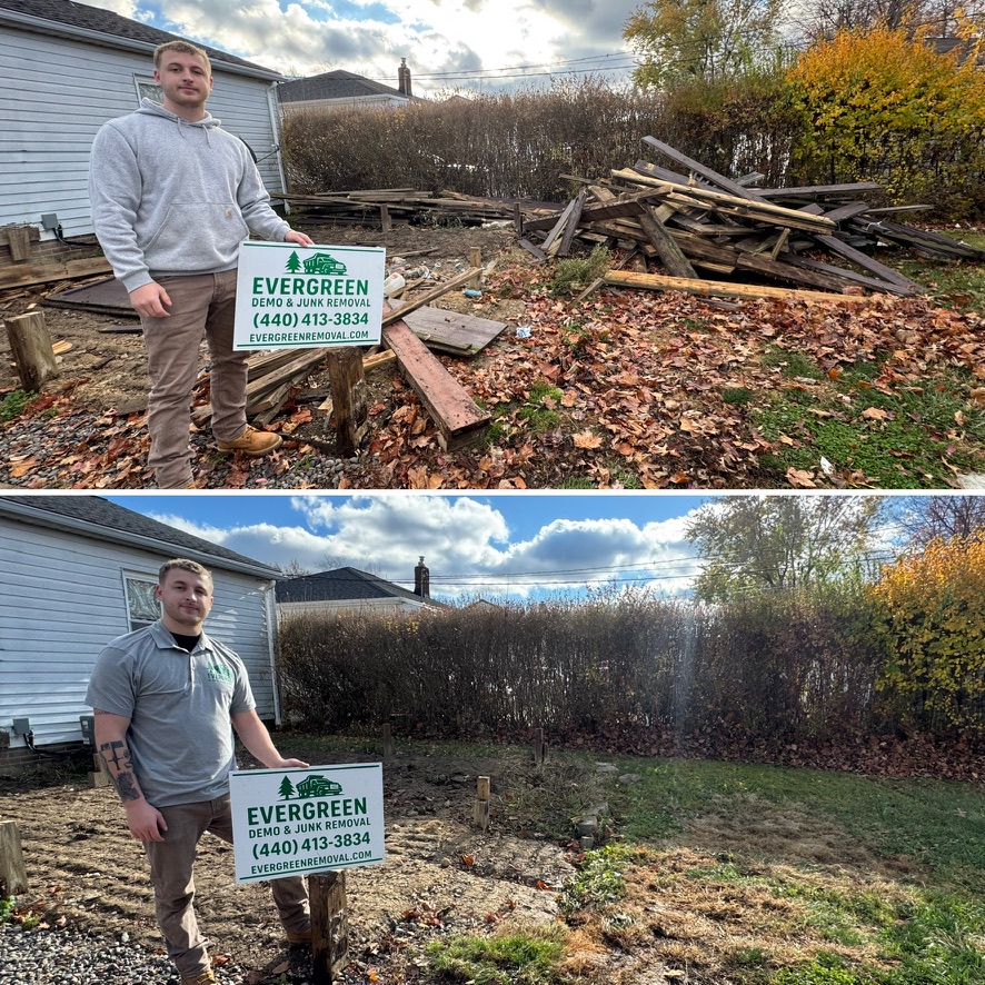 Yard debris and old boards cleared — property restored by Evergreen crew